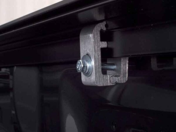 Lund 04-17 Nissan Titan (5.5ft. Bed w/Titan Box) Genesis Roll Up Tonneau Cover - Black - Image 8